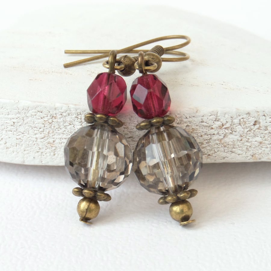 Bronze earrings with silver dust & garnet red crystals