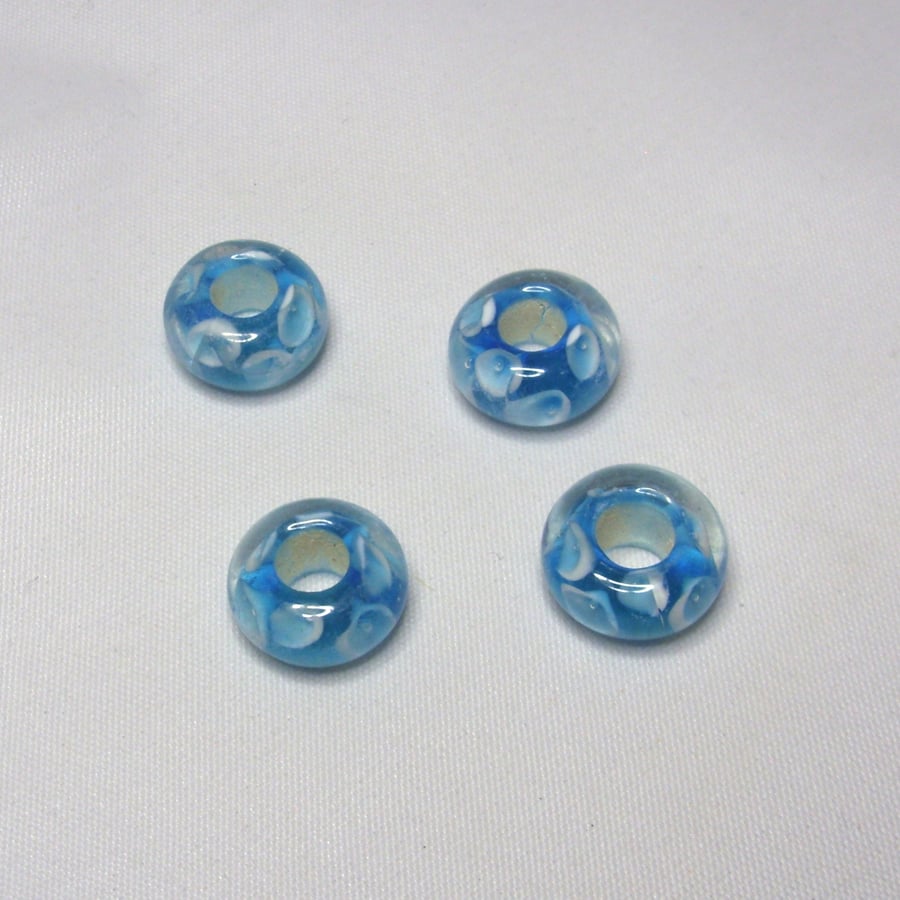 Pkt 4 Blue glass lampwork donut beads