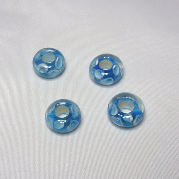 Pkt 4 Blue glass lampwork donut beads