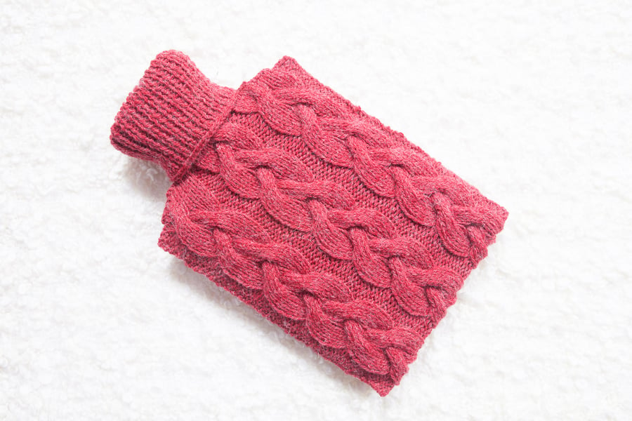 Hand knitted hot water bottle cover, cosy in red. Rustic bedroom, home decor