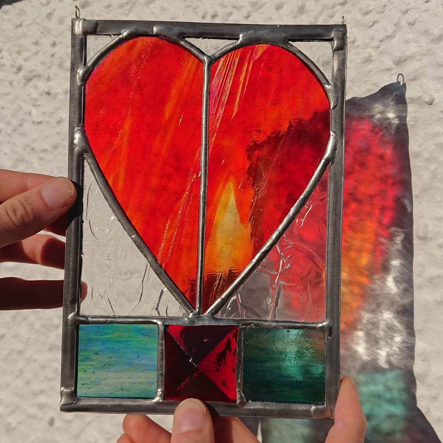 SOLD Stained glass ruby red heart hanging panel. Copperfoil and lead.