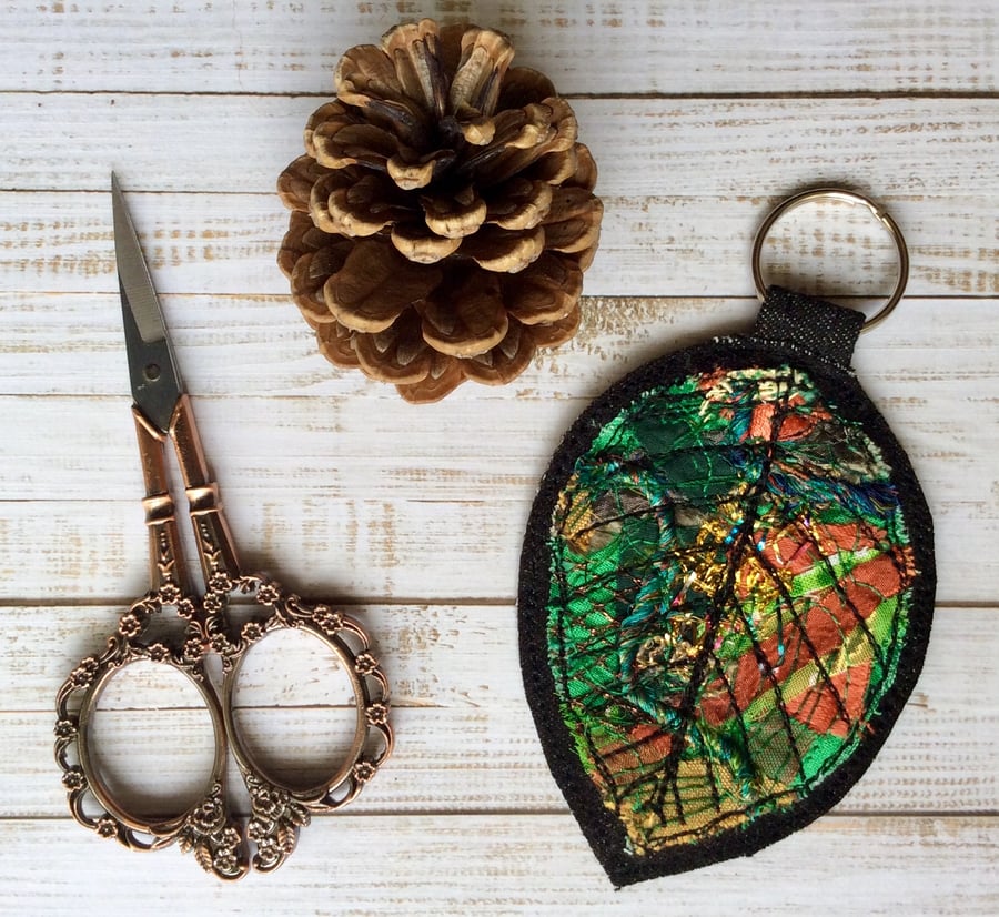Embroidered up cycled leaf keyring or bag charm.
