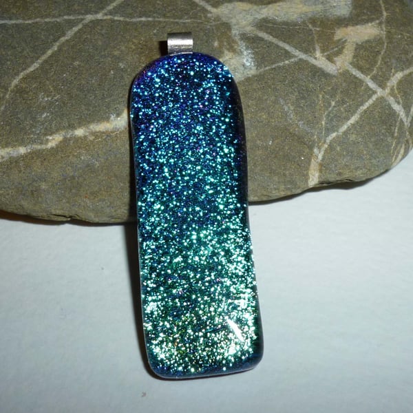 Hand crafted dichroic glass pendant with silver bail