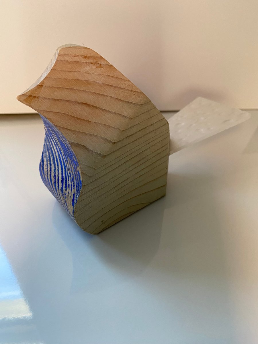 Bird ornament handmade from wood