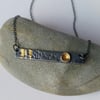 Oxidised Silver Bar Pendant Necklace with 24 carat Gold Cup Detail