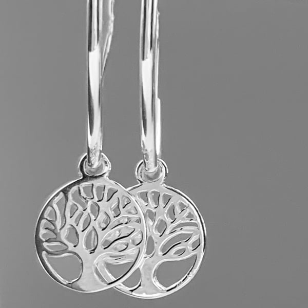Sterling silver hoop earrings with tree of life charm