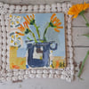 Flowers in a jug with collage .