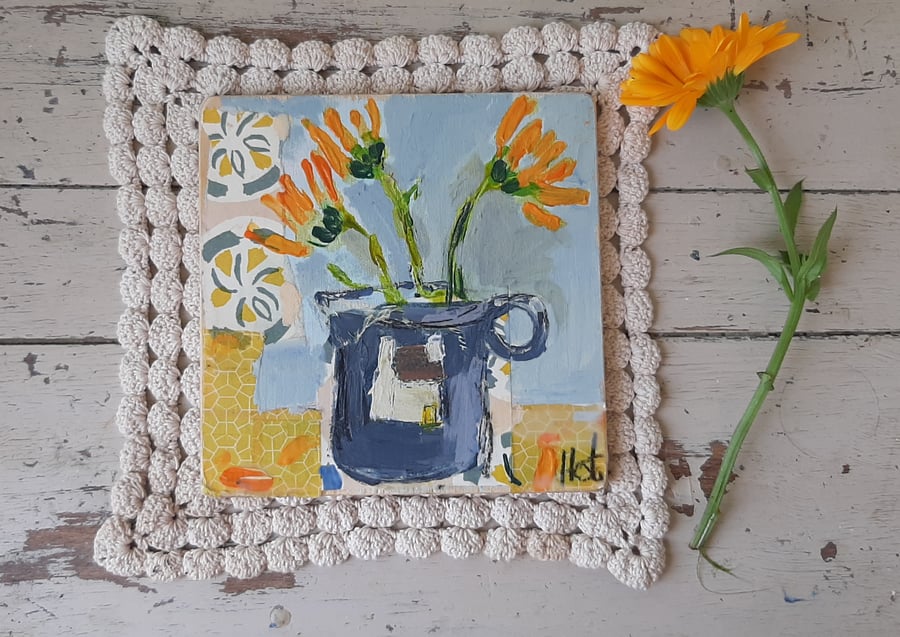 Flowers in a jug with collage .