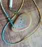 Abstract pebble pendant on glass bead necklace. - Image 4