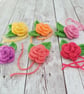 6 crocheted flower buds with leaves