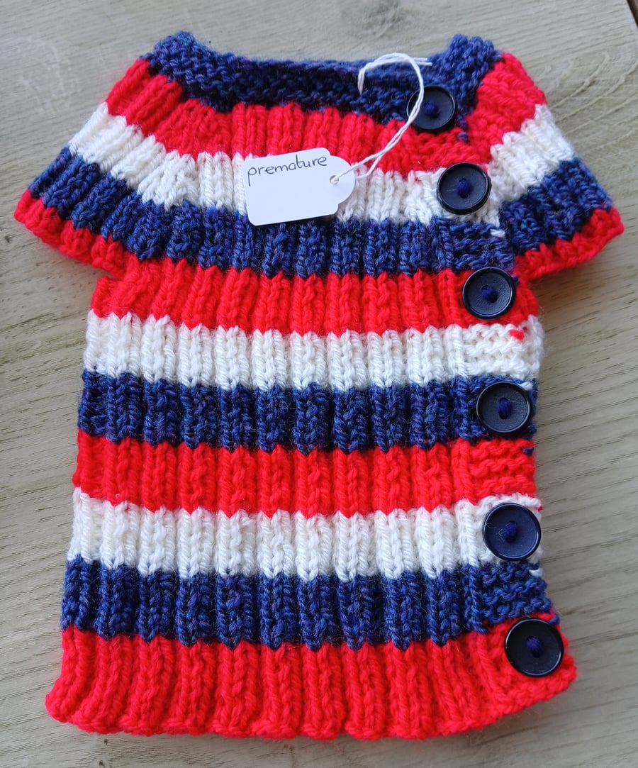 Handknitted baby top. Approx premature. Price includes P and P..
