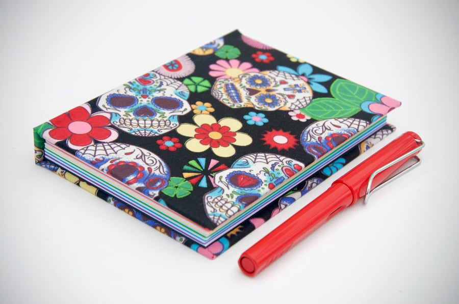 A6 hardback notebook with full cloth bright skull cover