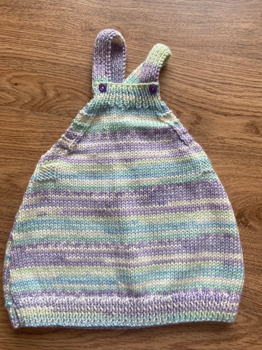 Knitted baby pinafore