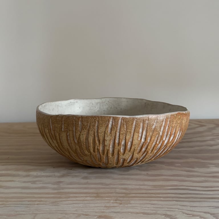 Handmade ceramic carved bowl