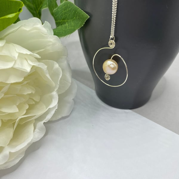 Freshwater rosebud pearl pendant with sterling silver wire spiral 