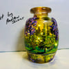 A hand painted and fired glass vase by Andrew Jenkins 