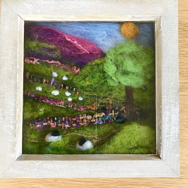 Needle felted landscape picture with sheep 