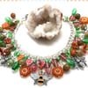 OOAK bee charm bracelet with Czech glass flowers and leaves