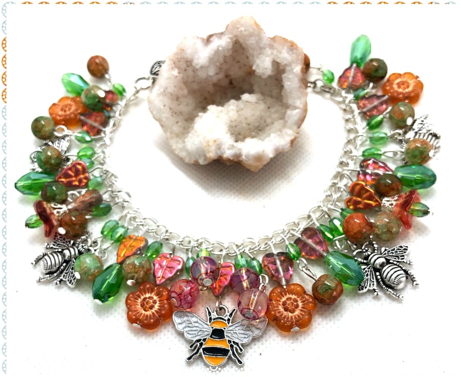 OOAK bee charm bracelet with Czech glass flowers and leaves