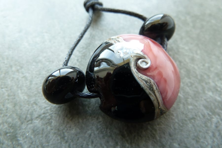 black and pink lampwork glass bead
