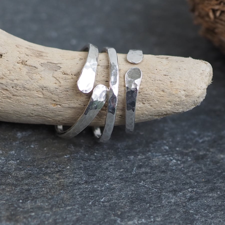 Set of three sterling silver rings with hammered texture