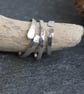 Set of three sterling silver rings with hammered texture