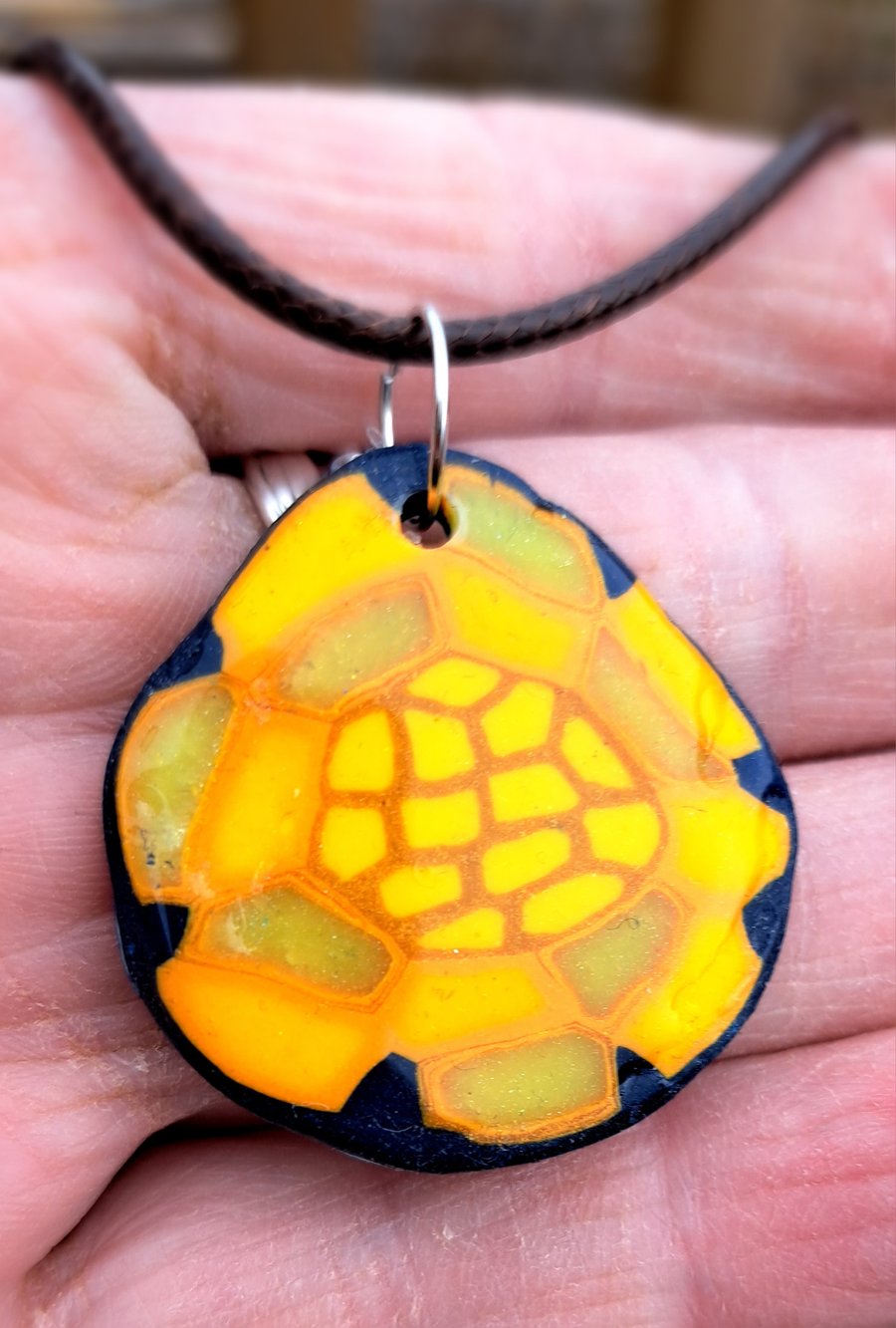 Ovid polymer clay sunflower themed pendant