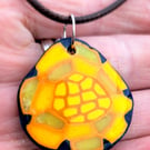 Ovid polymer clay sunflower themed pendant
