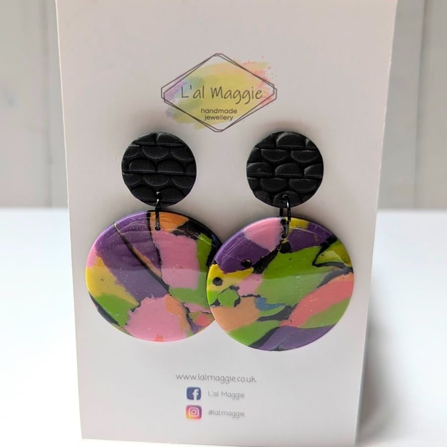 Carnival round drop earrings.