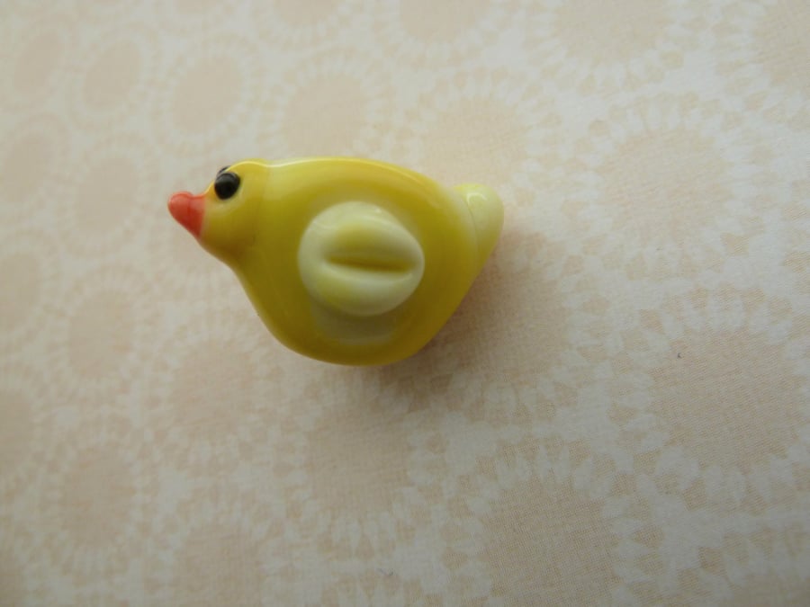 handmade yellow lampwork glass bird bead