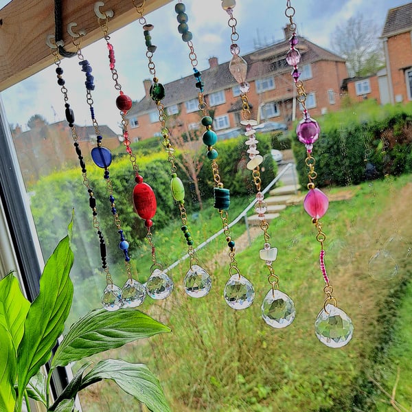 RED Gold suncatchers with crystals gems glass and upcycled plastic beads. 