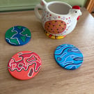 Coasters with planet design (set of 4)