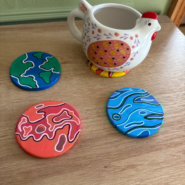 Coasters with planet design (set of 4)