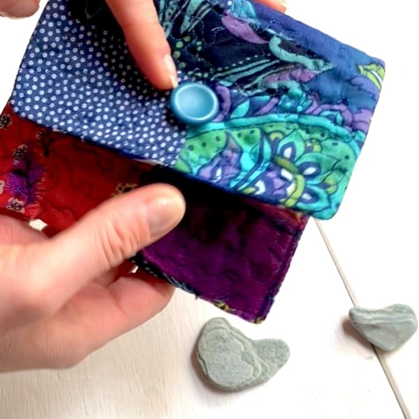 Versatile vanity pouch made from pre- loved fabric