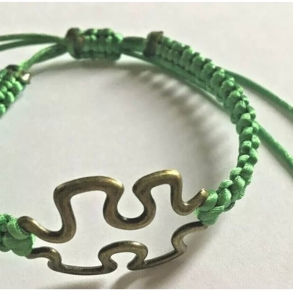 Antique Bronze colour Autism Awareness Jigsaw Charm on Green Macrame Bracelet 