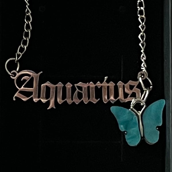 Silver italic zodiac x butterfly necklace 