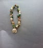 Elasticated moss agate and assorted bead bracelet with silver pumpkin charm  - Image 2