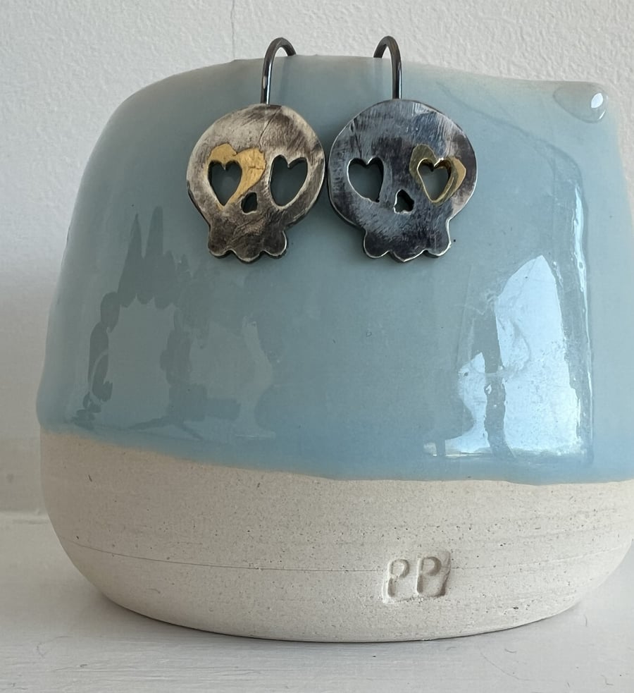 Spooky Silver Skull Earrings for Halloween with a touch of gold