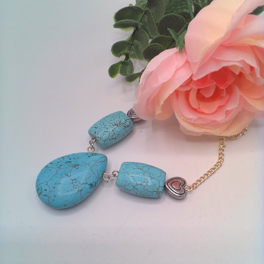 Turquoise Beads and Silver Plated Hearts Pendant on a Silver Chain Necklace
