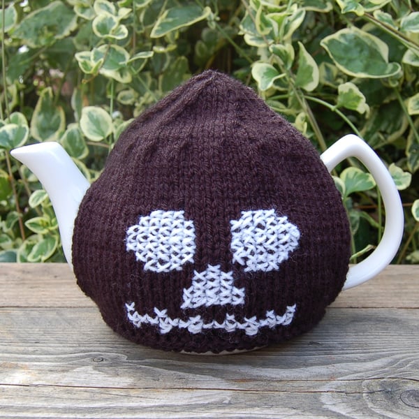  Halloween Tea cosy - hand knitted black and white skull design.   