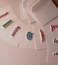 Christmas gift tags. Festive words. Ref 546