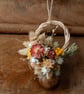 Mini handmade dried flower pink peachy and yellow wreath gift hanging