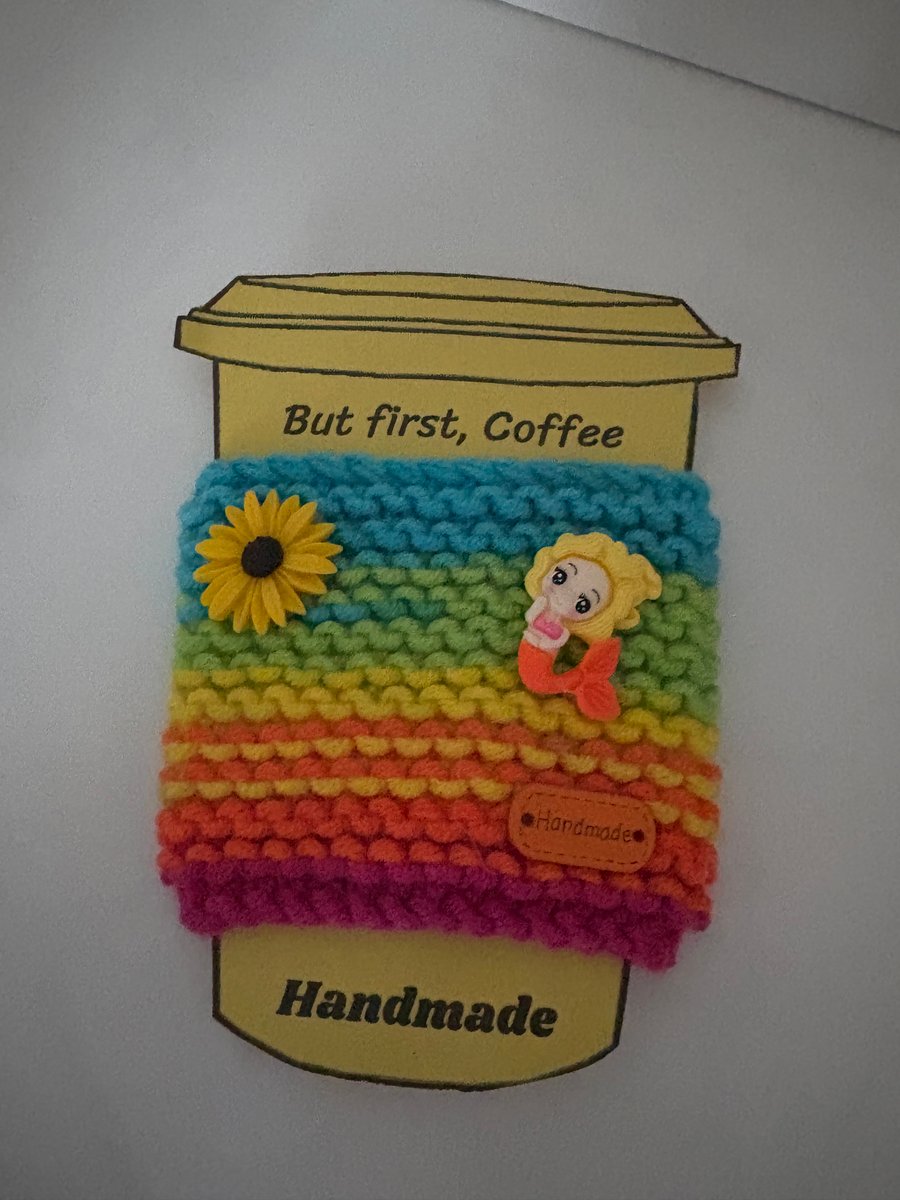 Mermaid knitted cup cosy. 