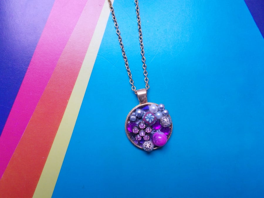 A Sparkling Bejewelled Cluster in a Pendant