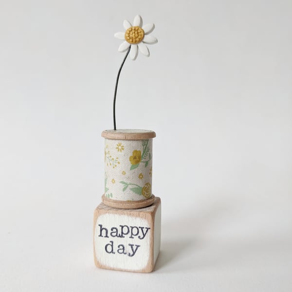 Clay Flower on a Teeny Bobbin 'happy day