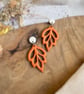 Autumn Minimalist Cutout Metallic Orange Polymer Clay Leaf Earrings - Image 7