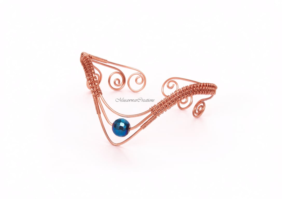 Wire-Wrapped Copper Arm Cuff with Dark Blue Faceted Hematite