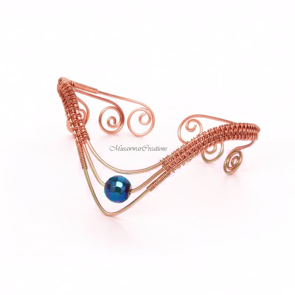 Wire-Wrapped Copper Arm Cuff with Dark Blue Faceted Hematite