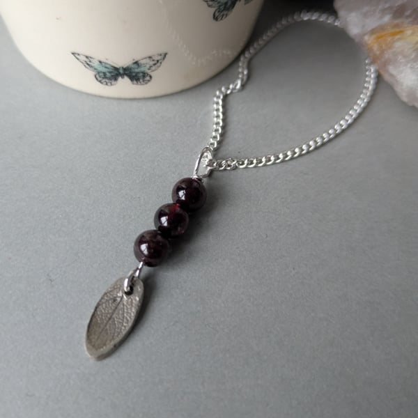 Energy boosting red garnet and silver necklace
