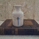 Stoneware bud vase with a dragonfly